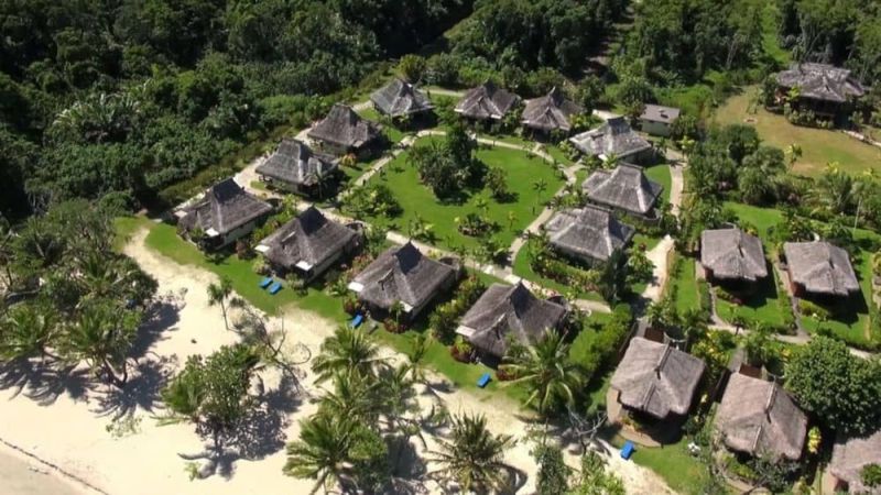 Aerial View of the Thatched Beachfront Bures Aerial View of the Thatched Beachfront Bures
