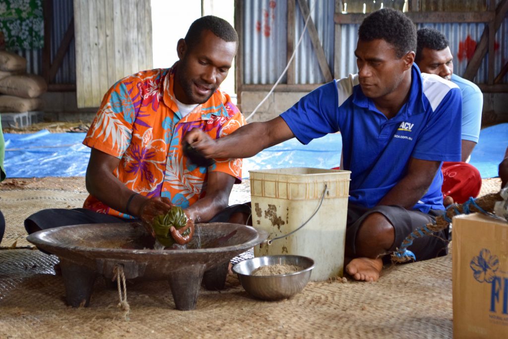 Mixing a yaqona bowl at Nabalesere Village Mixing a yaqona bowl at Nabalesere Village